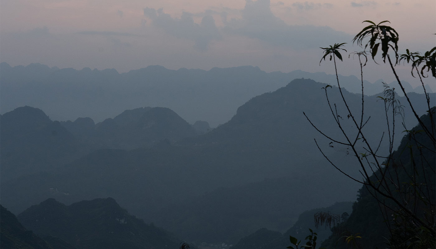 View of the hazy vietnamese mountains at sunset.